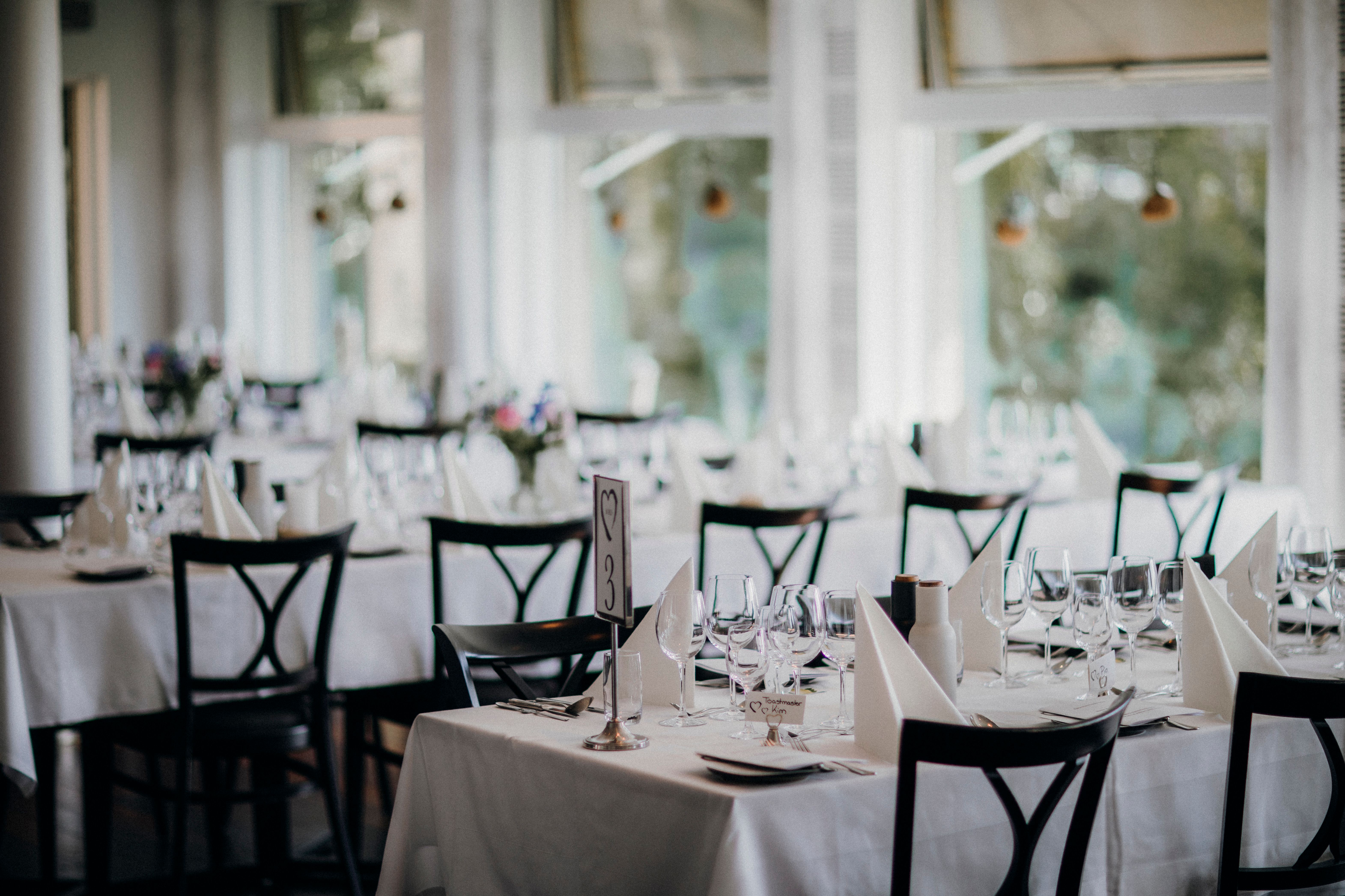 Elegant catered dining tables set for a celebration