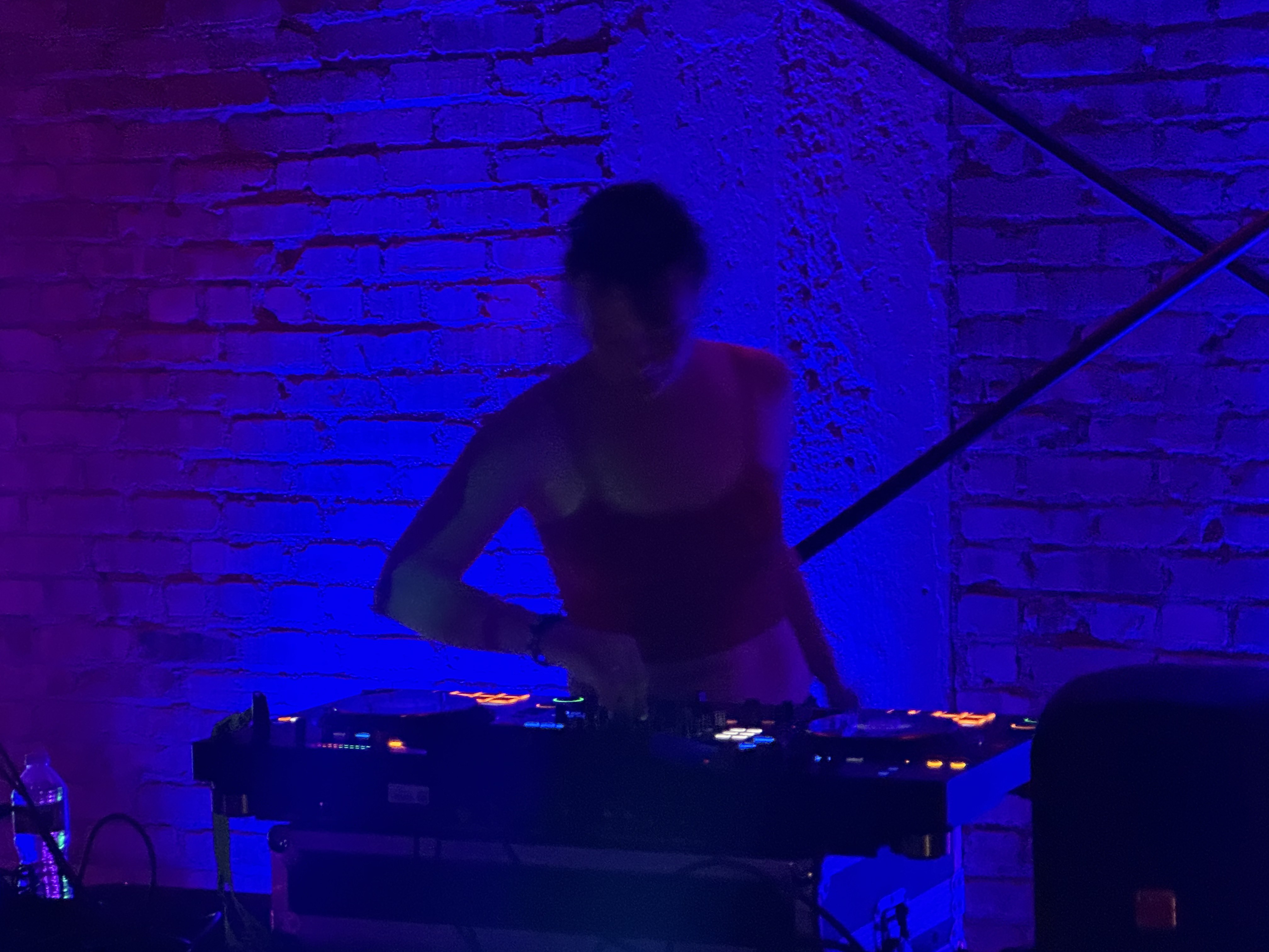 Studio320 DJ and room detail under colored lighting